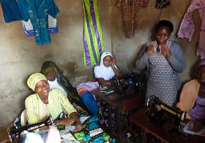 Four girls who have set up their own clothing business after two years of ASSEJA vocational training. Turing Project Visit, Februari 2012